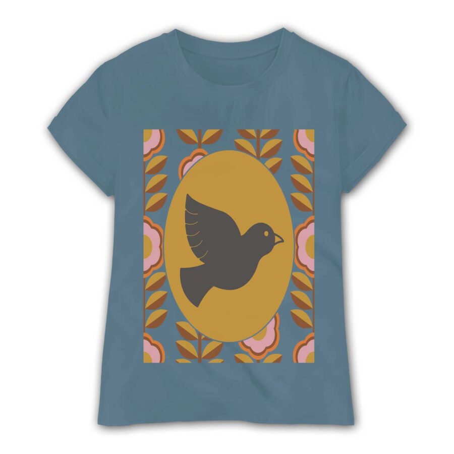01-6-peace-dove-tee-shirt-graphics-free-png-web A blue short-sleeved T-shirt featuring a large peace dove in the center, surrounded by a retro floral pattern with pink flowers and brown leaves. The design has a 1960s-inspired, vintage aesthetic.
